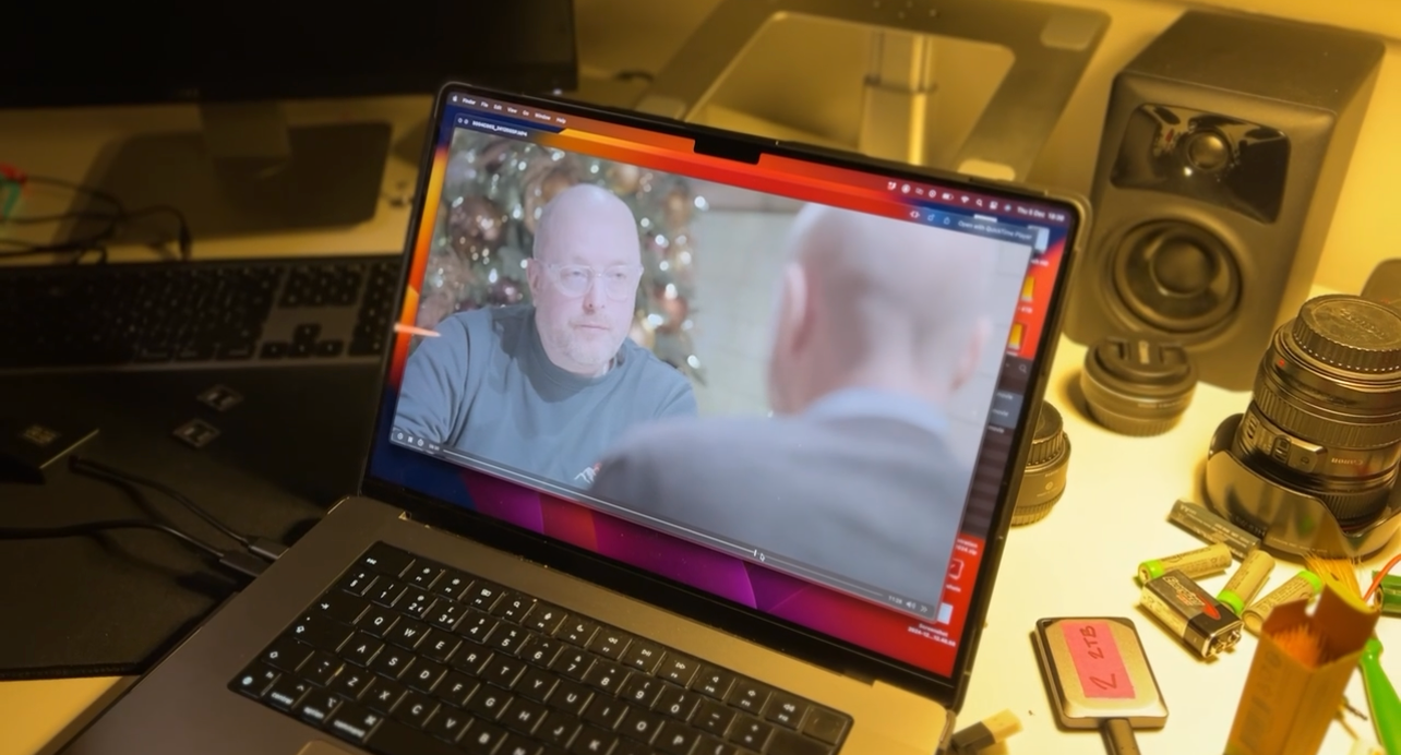 Chris reviewing a video production with a collaborator